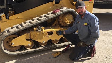 how to adjust track on c210 new holland skid steer|Track tension .